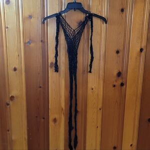 NWOT. WOMEN'S FISHNET BODY SUIT.